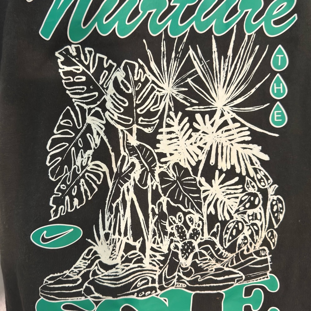 Nike Black Tee with Green and White Botanical Design